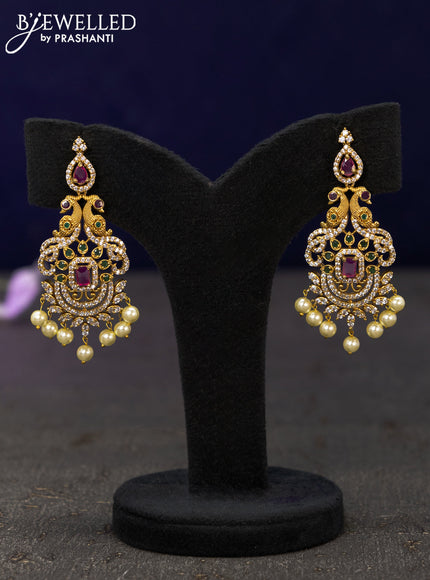 Antique earrings peacock design with kemp & cz stones and pearl hangings