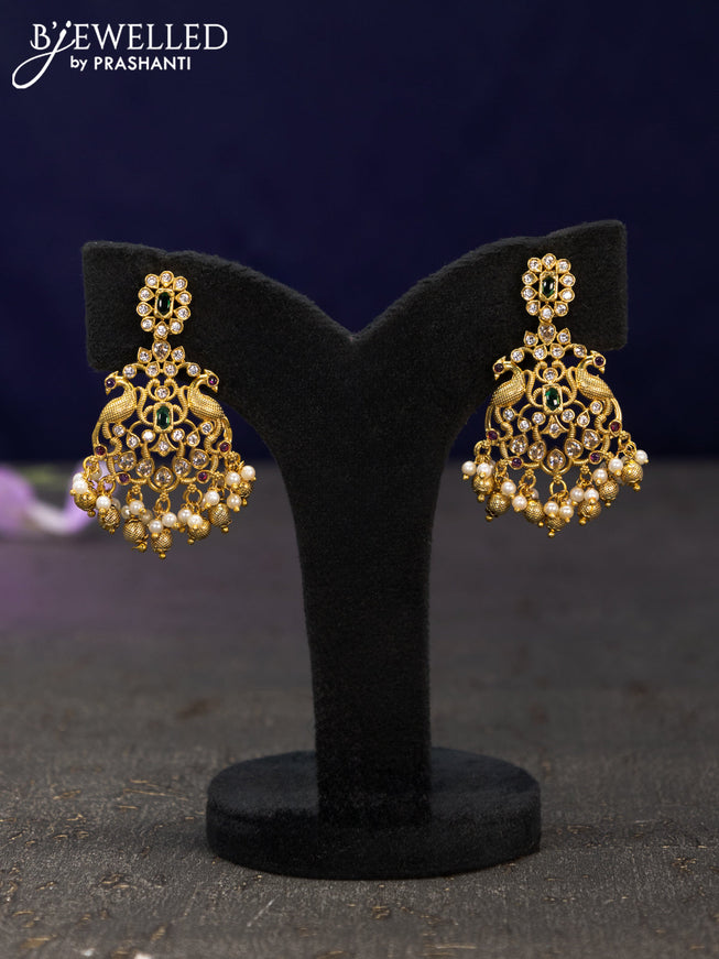 Antique earrings peacock design with kemp & cz stones and golden hangings