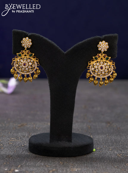 Antique earrings with kemp & cz stones and golden beads hangings