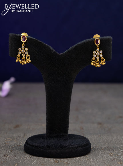 Antique earrings with pink kemp & cz stones and golden beads hangings