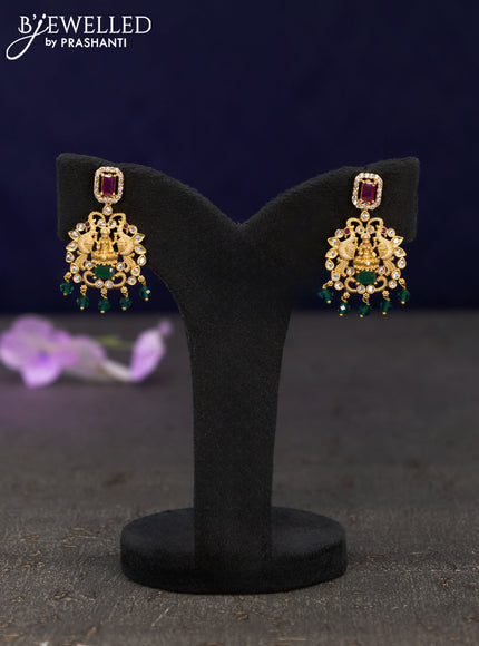 Antique earrings lakshmi design with kemp & cz stones and green beads hangings