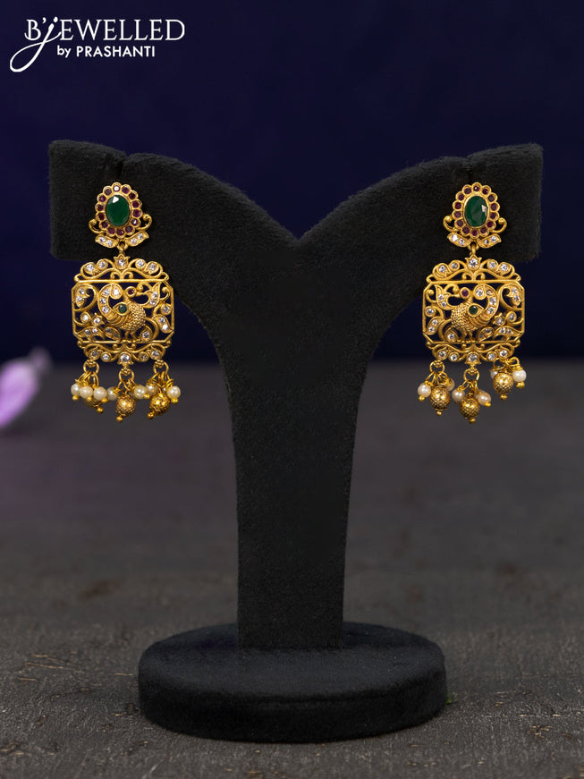 Antique earrings peacock design with kemp & cz stones and pearl hangings