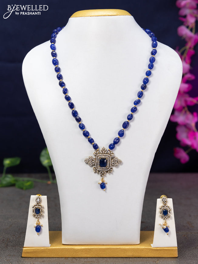 Beaded blue necklace with sapphire & cz stones and beads hanging in victorian finish