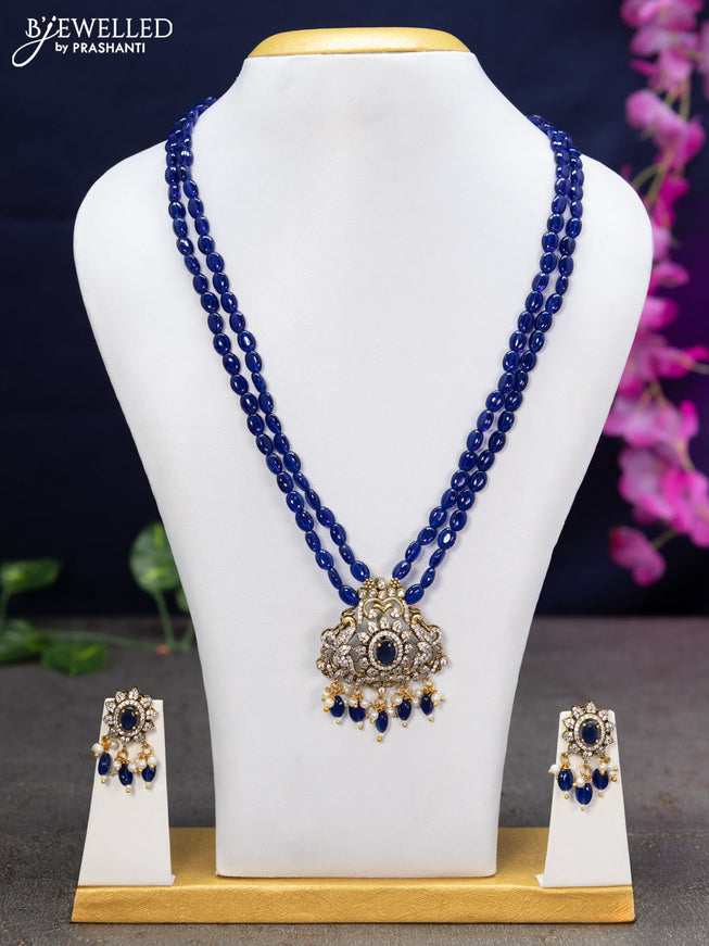 Beaded double layer blue necklace with sapphire & cz stones and beads hanging in victorian finish