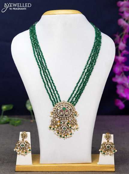 Crystal Beaded multi layer green necklace with emerald & cz stones and beads hanging in victorian finish