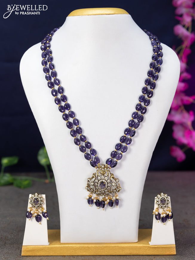 Beaded double layer violet necklace with cz stones and beads hanging in victorian finish