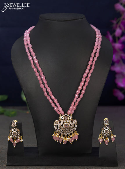 Beaded double layer baby pink necklace peacock design with cz stones and beads hanging in victorian finish