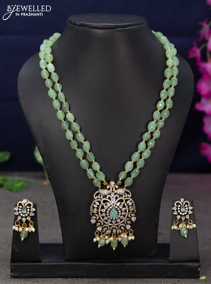 Beaded double layer mint green necklace with cz stones and beads hanging in victorian finish