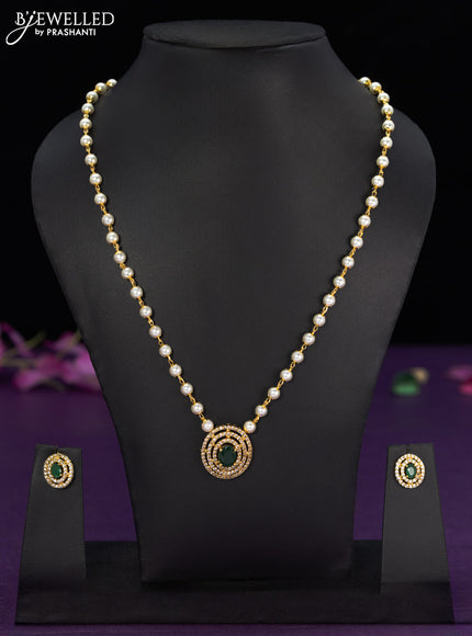 Pearl necklace with emerald and cz stones