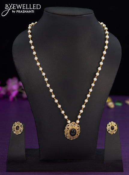 Pearl necklace with violet and cz stones