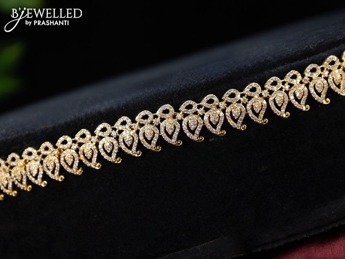 Zircon hip chain manga pattern with cz stones in gold finish