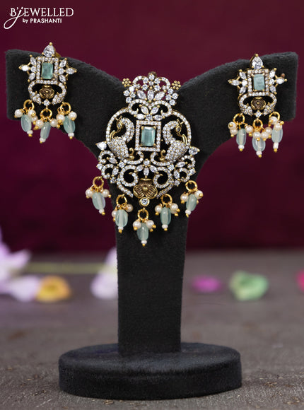 Victorian finish pendant set peacock design with mint green & cz stones and beads hanging