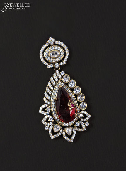 Victorian finish pendant set with ruby and cz stones