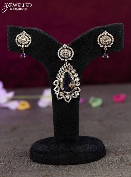 Victorian finish pendant set with violet and cz stones