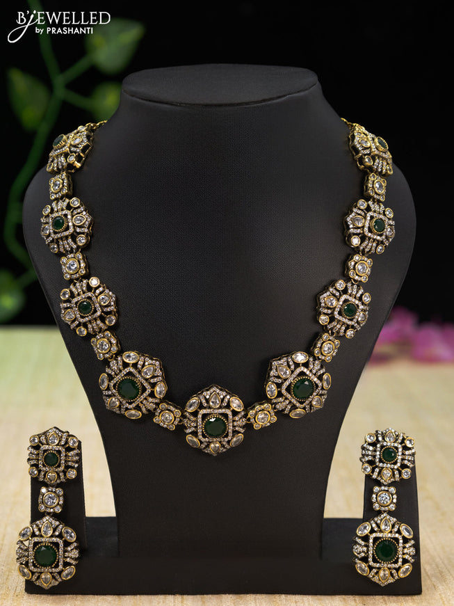 Necklace with emerald and cz stones in victorian finish