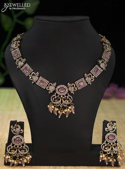 Necklace with baby pink & cz stones and beads hangings in victorian finish