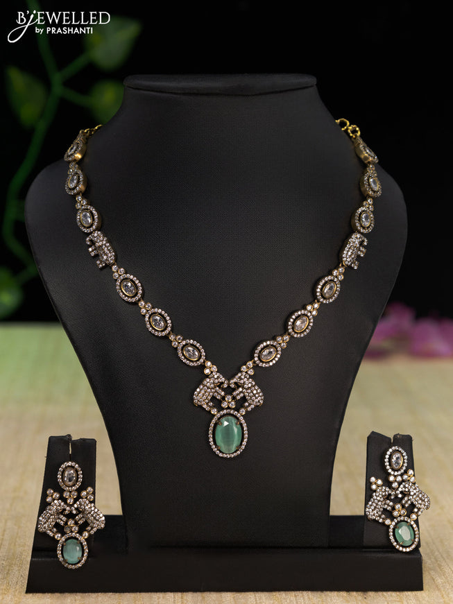 Necklace elephant design with mint green and cz stones in victorian finish