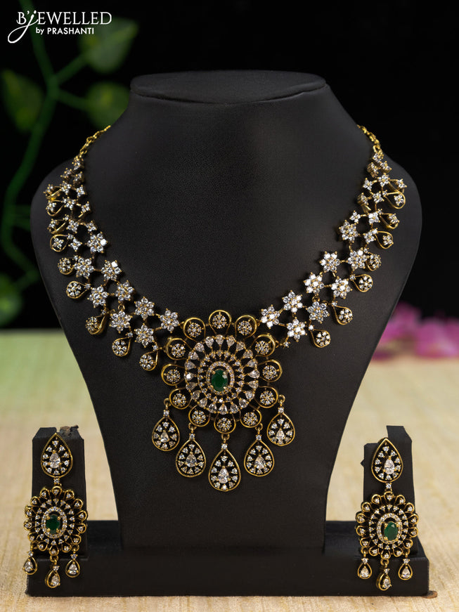 Necklace with emerald & cz stones and hangings in victorian finish