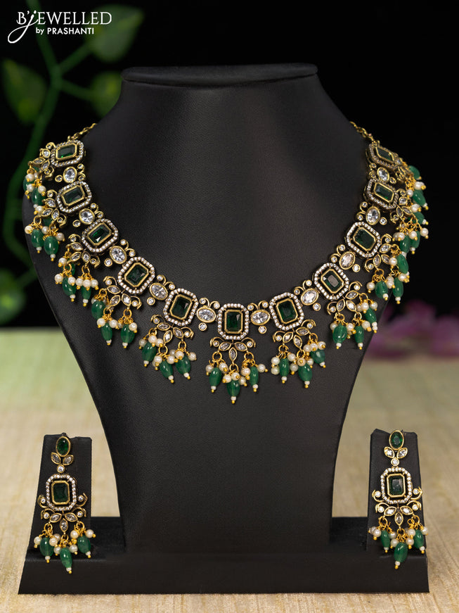 Necklace with emerald & cz stones and beads hangings in victorian finish