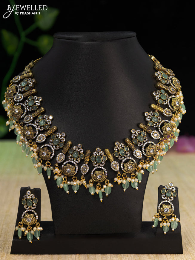 Necklace with mint green & cz stones and beads hangings in victorian finish