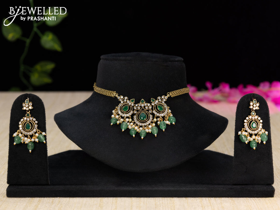 Choker with emerald & cz stones and beads hangings in victorian finish