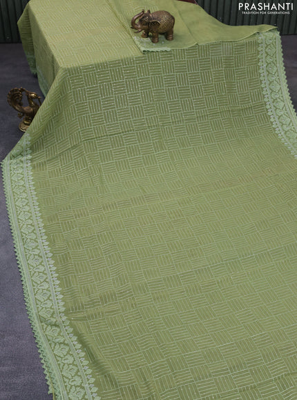 Chiffon saree green shade with allover chikankari & sequin work and lace work border