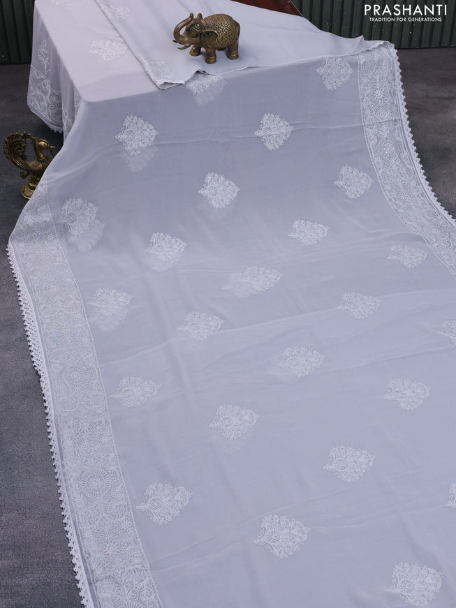 Chiffon saree pastel grey with chikankari work buttas and lace work border