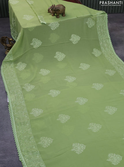 Chiffon saree pastel green with chikankari work buttas and lace work border