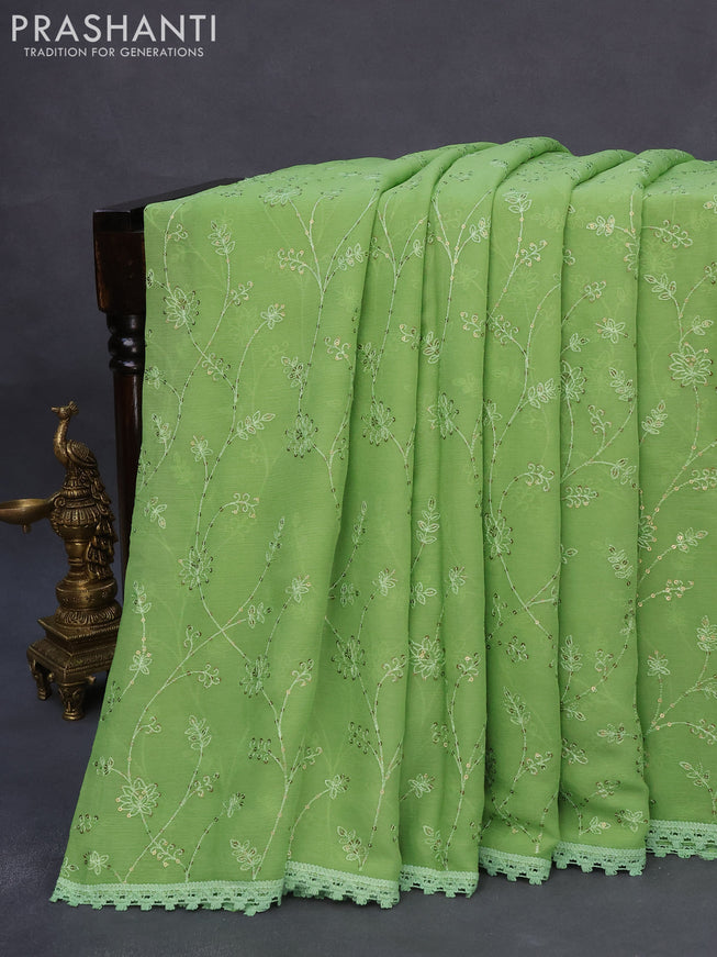 Chiffon saree green with allover chikankari & sequin work and lace work border