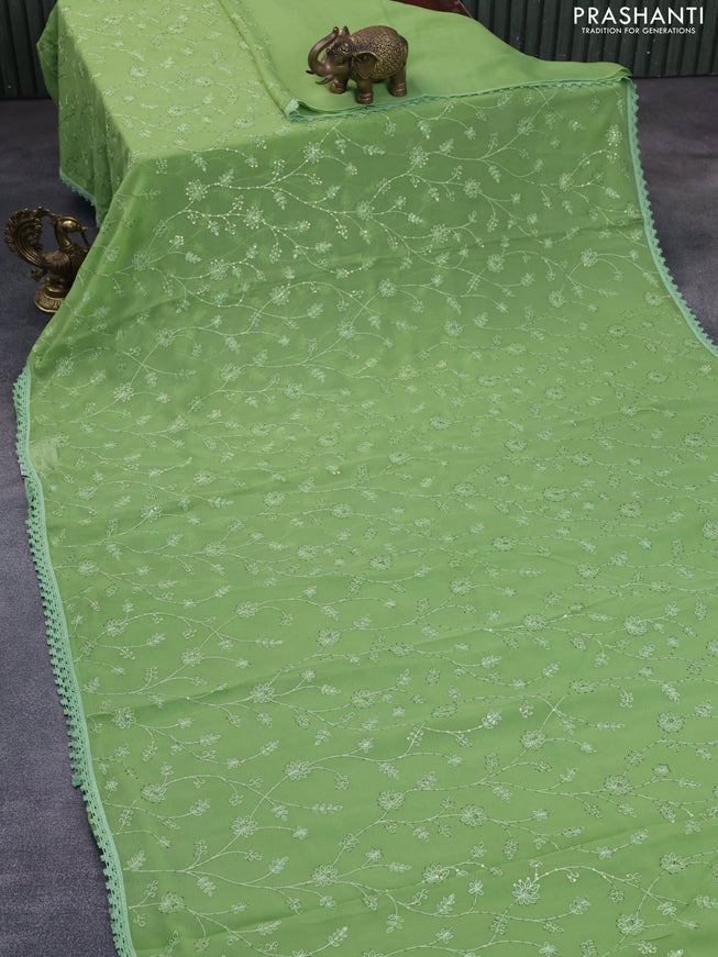 Chiffon saree green with allover chikankari & sequin work and lace work border