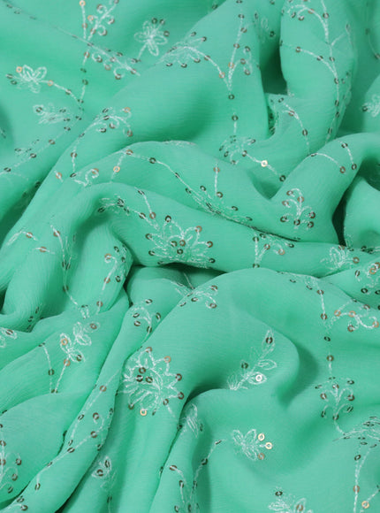 Chiffon saree teal green with allover chikankari & sequin work and lace work border