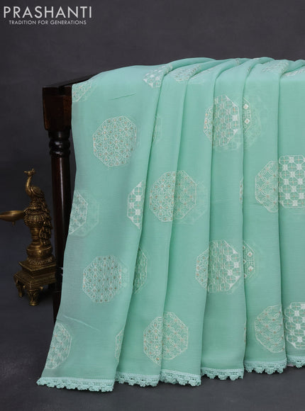 Chiffon saree pastel green shade with chikankari work buttas and lace work border