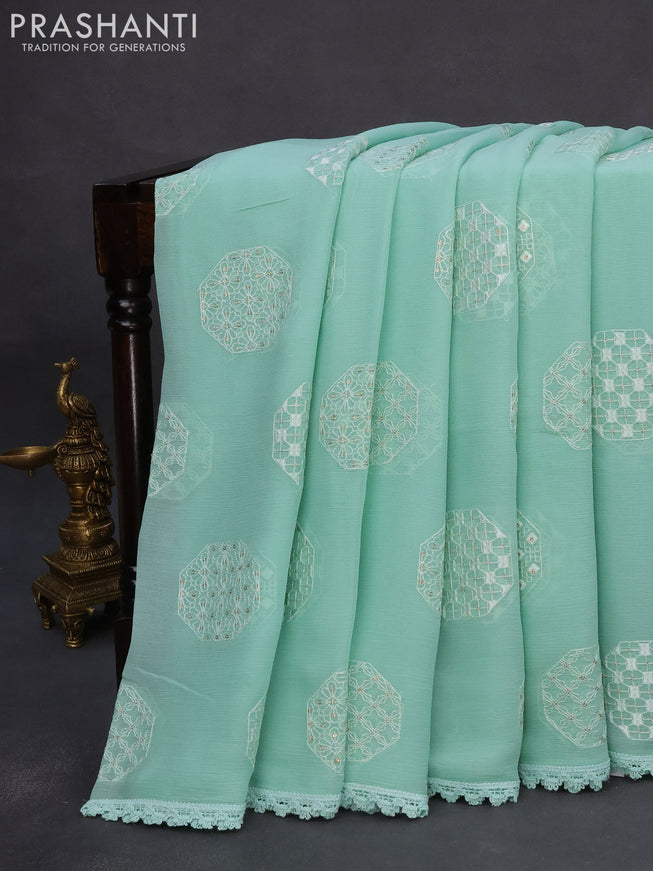 Chiffon saree pastel green shade with chikankari work buttas and lace work border