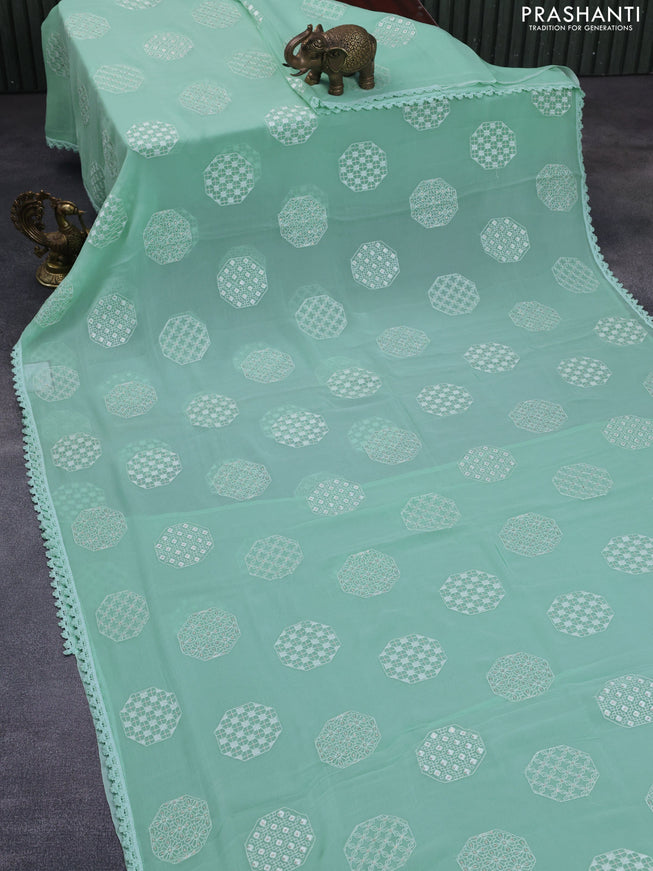 Chiffon saree pastel green shade with chikankari work buttas and lace work border