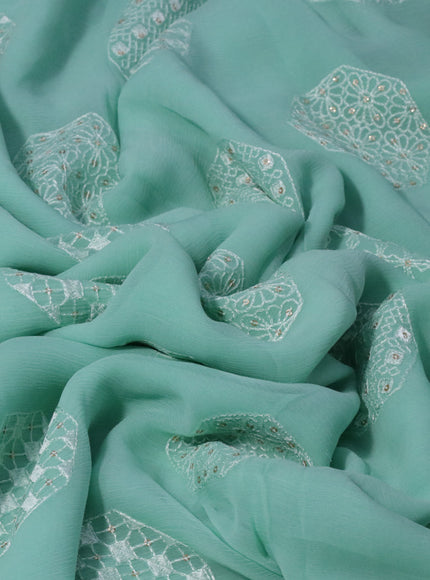 Chiffon saree pastel green shade with chikankari work buttas and lace work border