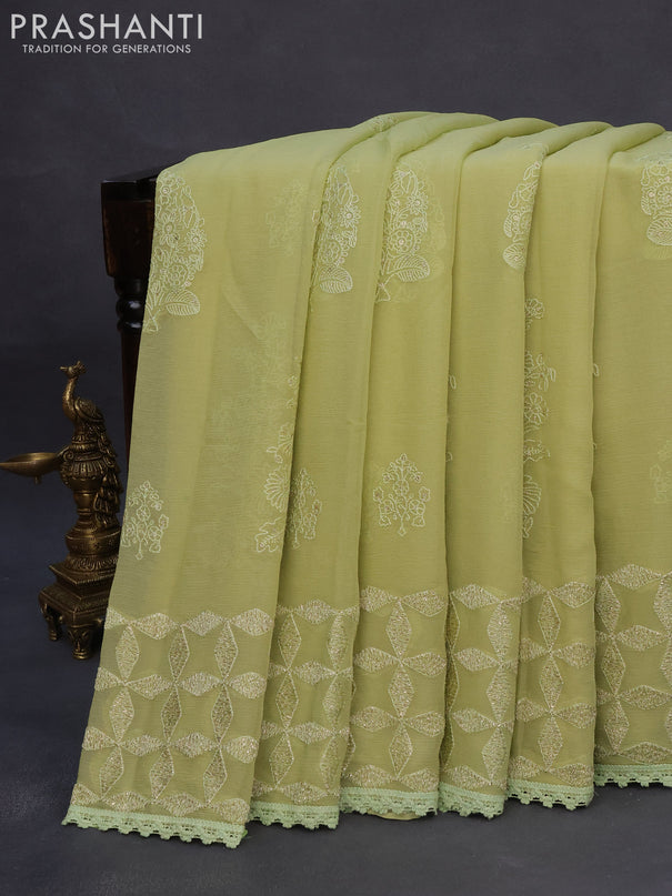 Chiffon saree pastel green with allover chikankari & sequin work and lace work border