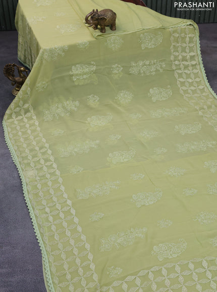 Chiffon saree pastel green with allover chikankari & sequin work and lace work border