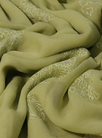 Chiffon saree pastel green with allover chikankari & sequin work and lace work border