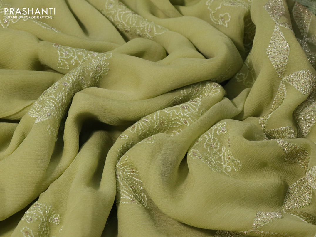 Chiffon saree pastel green with allover chikankari & sequin work and lace work border