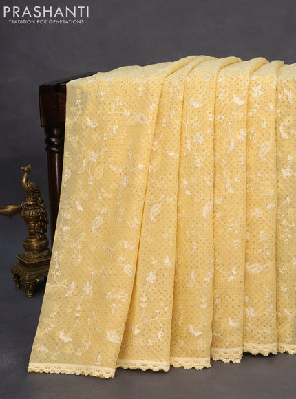 Chiffon saree pale yellow with allover chikankari & sequin work and lace work border