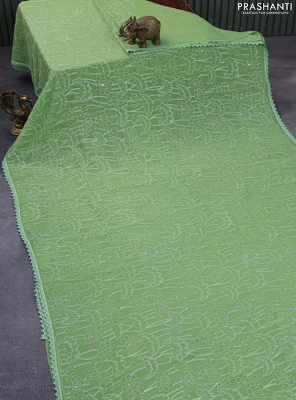 Chiffon saree green with allover chikankari work and lace work border