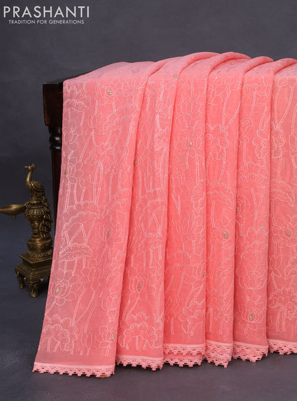 Chiffon saree peach pink with allover chikankari work and lace work border