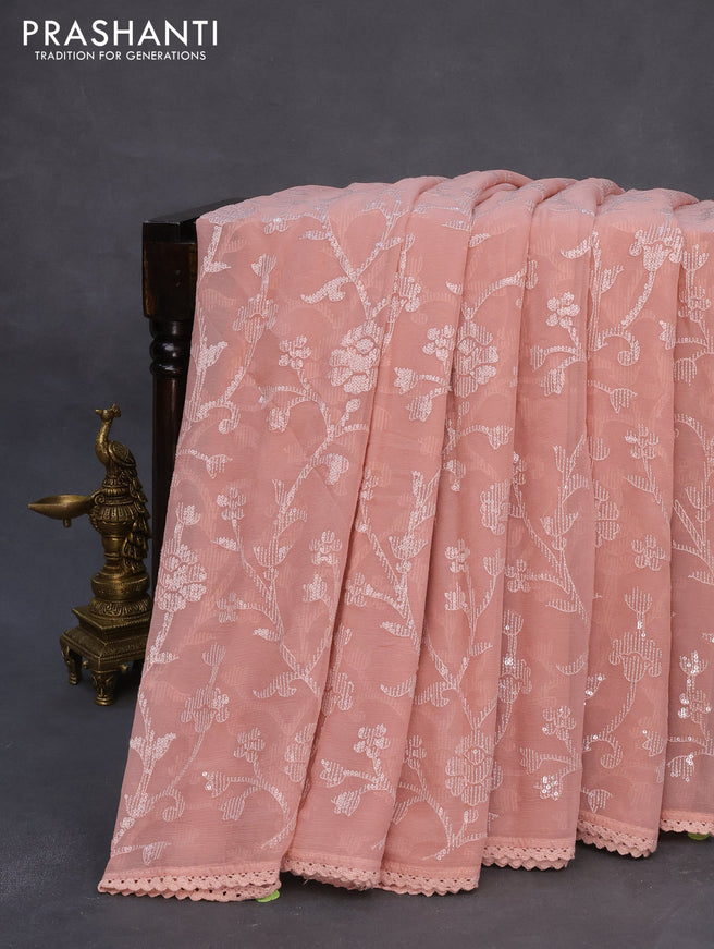 Chiffon saree peach shade with allover chikankari & sequin work and lace work border