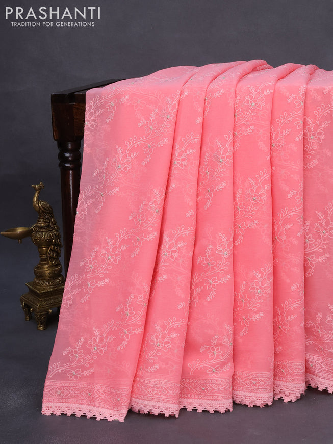 Chiffon saree peach pink with allover chikankari work and lace work border