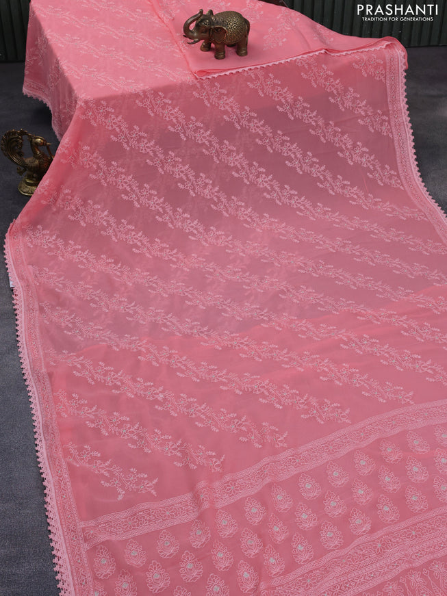 Chiffon saree peach pink with allover chikankari work and lace work border