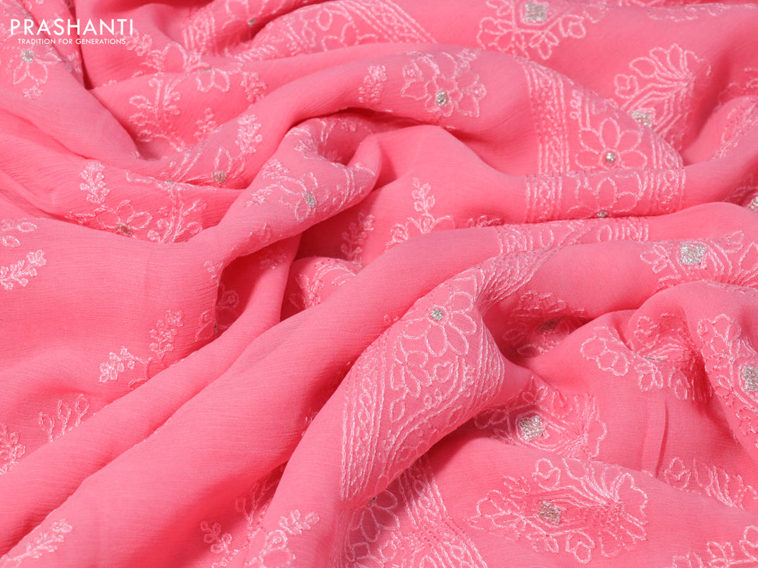 Chiffon saree peach pink with allover chikankari work and lace work border