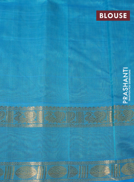 Silk cotton saree green shade and light blue with plain body and rettapet zari woven border