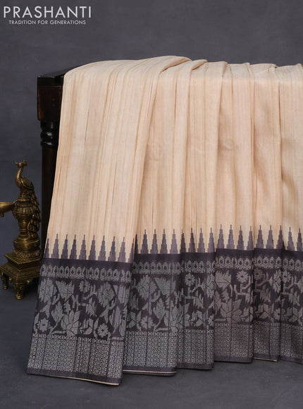 Semi tussar silk saree cream and black with plain body and long temple design ganga jamuna border