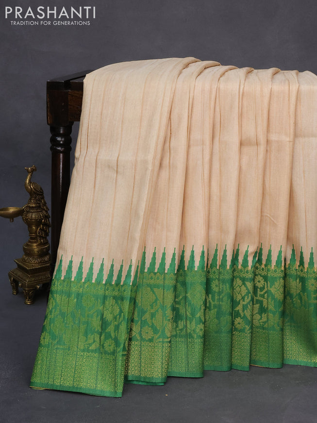 Semi tussar silk saree cream and green with plain body and long temple design ganga jamuna border