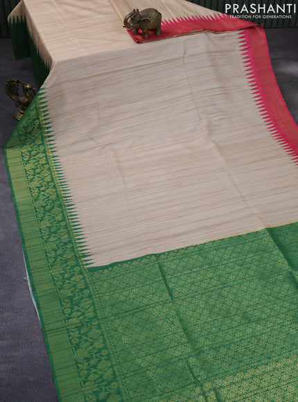 Semi tussar silk saree cream and green with plain body and long temple design ganga jamuna border